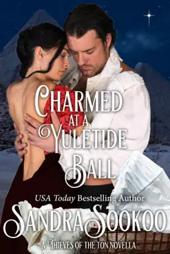 charmed at a yuletide ball book cover image
