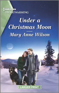 under a christmas moon book cover image