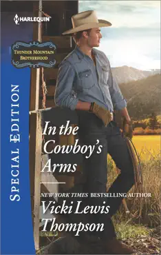 in the cowboy's arms book cover image